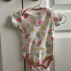 3  onesies. Fruity 3/6 months + teal/white are from Kyle and deena  6/9